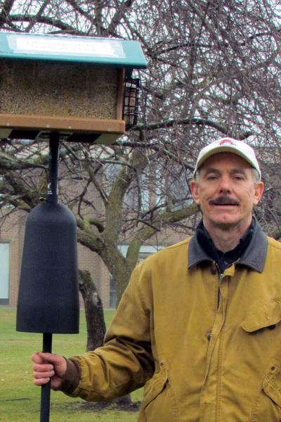 Don Scallen and birdhouse. Photo by Don Scallen